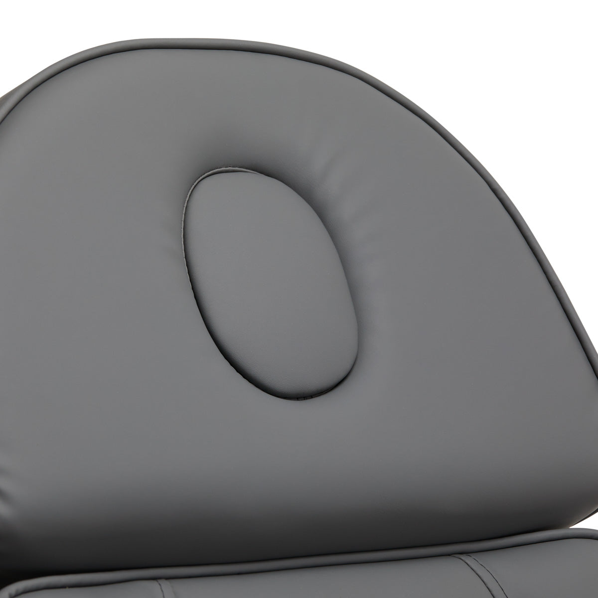 Close-up of grey Sillon Lux 273B electric treatment chair backrest with ergonomic cushion.