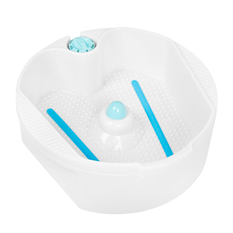 White pedicure foot spa basin with blue accents and massage jets.