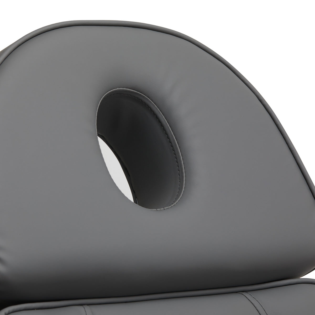 Close-up of the grey Sillon Lux 273B electric treatment chair backrest with circular head opening.